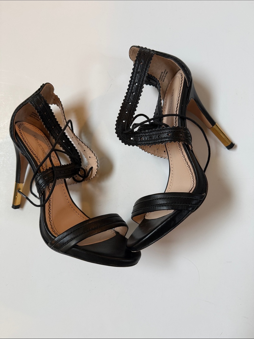 Pour La Victoire Shanna Black Nappa Lace-Up Stiletto Heels with Gold Accent